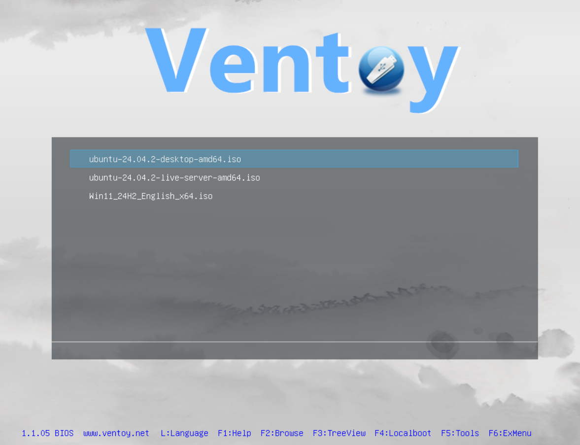 Ventoy boot menu screen showing three bootable ISO files: ubuntu-24.04.2-desktop-amd64.iso (selected), ubuntu-24.04.2-live-server-amd64.iso, and Win11_24H2_English_x64.iso, with Ventoy version 1.1.05 BIOS displayed at the bottom