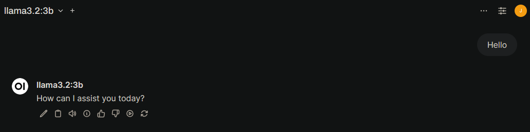 Open WebUI chat interface showing a 'Hello' message sent to the llama3.2:3b model, which responds with 'How can I assist you today?' confirming the local AI is working